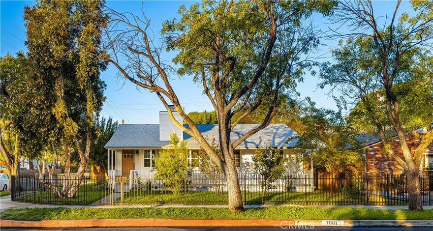 THIS IS IT! Welcome to this stunningly reimagined POOL home with a charming front porch, perfectly situated on a desirable corner lot in Lake Balboa! This beautifully remodeled 3-bedroom, 2-bath residence has been thoughtfully upgraded throughout and is truly turnkey and move-in ready. With a spacious backyard, sparkling private pool, and inviting  porch, this home truly has it all. Step inside to discover a bright, open, and refreshed interior. You’ll love the warmth of the original hardwood flooring and the abundance of natural light that fills every room. The fully remodeled kitchen is a true showstopper – featuring gorgeous new cabinetry, luxurious countertops, custom backsplash, and brand-new stainless-steel appliances. The primary suite serves as your own private retreat, featuring direct access to the expansive backyard. Two additional bedrooms offer comfort and versatility—perfect for guests, family members, or a home office. Outside, your private backyard oasis awaits. Enjoy the sparkling pool, covered patio area, and generous yard space—ideal for morning coffee, weekend BBQs, or simply soaking up the California sunshine. The gated front grassy yard adds even more charm and privacy, while the detached 2-car garage provides excellent storage and parking. Ideally located near local dining, schools, parks, and major freeways, this home checks all the boxes. 7001 Lasaine Ave is the home you’ve been waiting for—beautiful, upgraded, and ready to enjoy!
