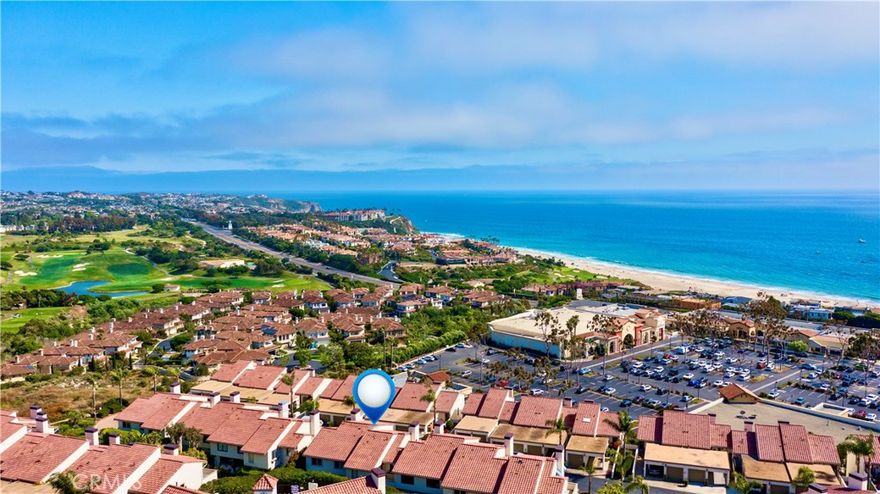 Located in the prestigious enclave of Monarch Beach within the secluded gated community of Monarch Bay Villas, this remarkable ocean-view end-unit villa has recently undergone an extensive and meticulous renovation from top to bottom including new PEX piping, sliding glass doors, new duct & heating system, water heater, recessed lighting, new air conditioner, top of the line whole house water filtration system, Insta Hot water system, new kitchen, new baths, wide plank flooring, custom closets throughout, custom window coverings throughout, new decks, fencing, hard and soft scape, landscaping, irrigation, new fencing and much more.  The spacious living room serves as a captivating focal point with its lofty wood-beamed ceilings, inviting fireplace, and, notably, the allure of the large private balcony offering refreshing ocean and golf course views. The expansive gourmet kitchen showcases elegant custom cabinetry, quartz countertops, a large island at its center, and top-of-the-line built-in appliances, including a 42" refrigerator, dishwasher, gas range & oven, disposal and trash compactor.  Just off the kitchen, enjoy some downtime in the family room or embrace the indoor-outdoor lifestyle on the well-appointed private patio awaiting you with hard and soft scaping and private hot tub. Upstairs, the primary suite offers a private ocean view balcony.  The home boasts white water views of Salt Creek Beach as well as Catalina Island to the Dana Point headlands, the iconic Monarch Beach Golf Links the oceanfront golf course designed by premier golf course architect Robert Trent Jones Jr., majestic landscapes of two world-class luxury resorts—the Ritz Carlton and the Waldorf Astoria.  An oversized 2 car garage has built in storage cabinets and a large separate storage closet and an EV charger.  The Monarch Bay Villas community provides direct trail access to the Salt Creek Trail, Waldorf Astoria, a variety of restaurants, cafes, salons, fitness facilities, and shopping destinations at the nearby Monarch Bay Plaza. All residences within Monarch Bay Villas received a new clay tile roof and freshly painted exteriors in 2022. Whether you seek a primary residence or an enchanting vacation retreat, this extraordinary opportunity invites you to own your slice of coastal paradise in the hidden gem of Monarch Bay Villas.  Community amenities include a private pool, spa, clubhouse, billiards room, fitness room, dry sauna, restrooms, open green spaces and barbecue area.