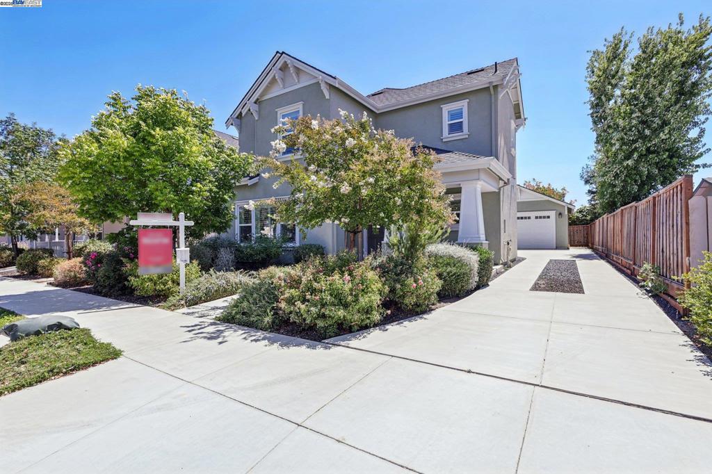Discover modern living just moments from downtown Livermore in this stylish north-facing home built in 2018. Boasting a versatile floor plan, the main level features a convenient bedroom and full bath—ideal for guests or multi-generational living—alongside newer luxury vinyl plank flooring and dual pane windows throughout. The updated kitchen shines with a gas cooktop, slab stone countertops, and an open layout perfect for entertaining. Upstairs offers three additional bedrooms and a full bath, including a spacious primary suite with a large walk-in closet and a luxurious bath featuring a glass-enclosed shower and soaking tub. The detached garage provides potential for an in-law unit or ADU addition. Enjoy walkability to downtown Livermore’s shops and restaurants and a quick commute via the nearby ACE Train to Silicon Valley.