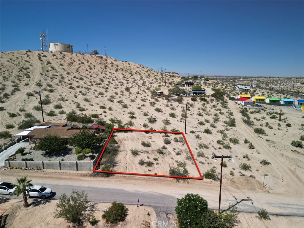 Amazing vacant parcel of land situated in the heart of the downtown district of 29 Palms. Located within walking distance to boutique shopping and gourmet dining, and not far from local schools and the famous Joshua Tree National Park! Found on Hillside Avenue, this location offers not just the convenience of being close to some of the best things 29 Palms has to offer, but also provides one incredible view! The lot is angled to capture beautiful vistas of the lovely desert, allowing you to enjoy the Twentynine Palms landscape while relaxing on your front porch. As an added convenience, Hillside Avenue is a paved road, and utilities are very close, with water in the street and power poles adjacent to the land, making development much easier! Come make your dream of owning your own piece of the desert a reality with this blank canvas today!