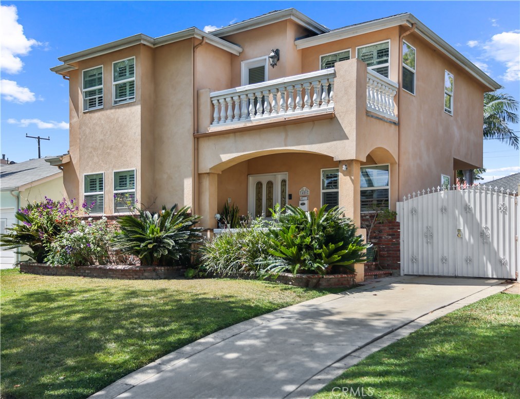 Amazing opportunity to own a wonderful 4 bedroom home with over 3,000 square feet! This home boasts: 4 bedrooms (One bedroom is on the main floor) Perfect for guest and/or family member who has less mobility. 3.5 baths (Downstairs has one full bath next to bedroom and one half bath for guest downstairs) with approx. 3,127 square feet on a very well maintained lot. The home was re-built in 1999. The main floor features: Living room, dining room, fire place in the family room, kitchen, bedroom, laundry room and two baths. The charm of the archways and warm colors makes it the perfect place for everyday living and entertaining. The upstairs features: 3 nice size bedrooms and two baths. (Fire place in the primary bedroom)The balconies are a terrific place to enjoy your morning coffee and evening breezes. The private backyard has a covered area for your BBQ's. The detached garage is currently used as a hobby/work space. This could be converted to an ADU. The long driveway makes it easy to park your cars. This beautiful 3000+ sq. ft. home with 4 nice size bedrooms is on a tree lined street and is a must see. DO NOT DELAY-COME TAKE A LOOK TODAY!