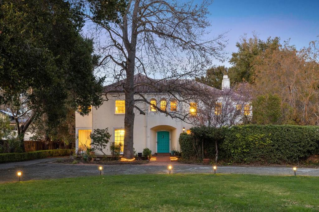 A coveted neighborhood with rare opportunity to build new or restore a Spanish Colonial Revival home to its original glory. To be sold with 1433 Webster St, APN: 120-35-044. The site has 150' street fronts on Webster and Byron, two existing homes, sweeping lawns, majestic trees, patios, courtyards, gardens, pool, pool house and ADU. Originally built in 1921, the homes Old World grandeur is evident with oak parquet floors, stately ceiling heights, arched divided-light windows and double doors to grand-sized public rooms with fireplaces and floor-to-ceiling windows with garden and terrace views. The foyer opens to the formal living room, adjoining office-library, the family room, formal dining room and kitchen with primary and secondary cooking centers. Upstairs, the primary suite has a fireplace, walk-in closet, hidden wood-paneled office and two bathrooms. Surprises continue throughout, including a discreet staircase off the kitchen and an aviary that precedes the 852± sf attic space.