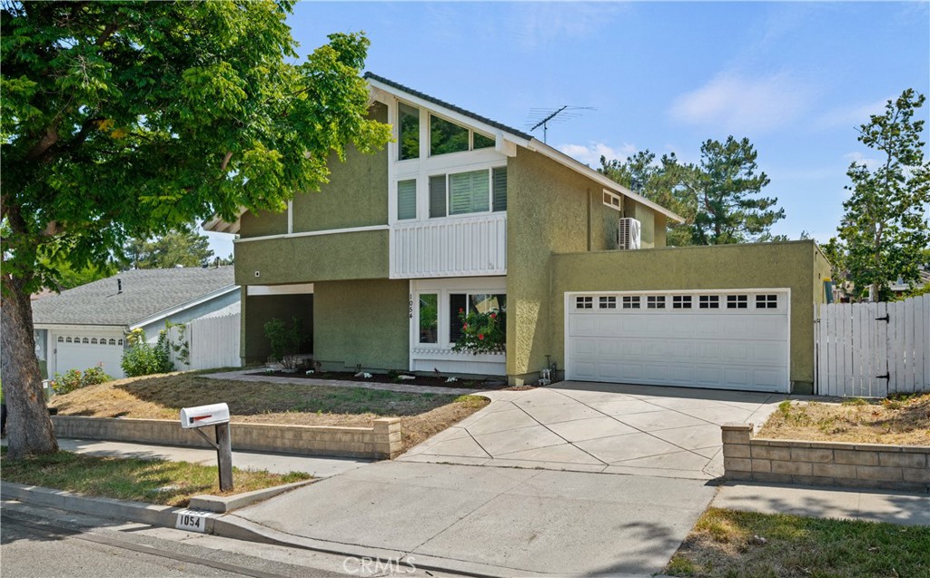Large Family Home in Quiet Neighborhood. Don't miss this 5 BR, 3 Bath ideally located Home in mid Simi Valley. Features include, 4 year new Kitchen Remodel with Custom solid Maple Dual 90's Shaker Soft Close Cabinets, Quartz Counters, 5 Burner Cook top, G.E. Oven, Microwave and Dishwasher. Living Space is beautifully enhanced with Crowne Molding, Bullnose corners, Oversized Baseboards, Dual Paned Vinyl Windows, Canned Lighting, Dual Fuel Fireplace, Herringbone wooden Pony wall, and Fresh paint. Downstairs Bedroom is enhanced with Built in African Mahogany Wardrobe. Primary Bedroom is Huge and includes Jacuzzi Jet Tub in ensuite Bathroom, Added Storage with Electrical hidden in back of ensuite Closet. All Bedrooms have added Ceiling Fans. All 3 Baths have been Retiled. Back Patio has Cathedral Cover for Comfy Relaxation. Unseen Features include 12" Cellulose Insulation in Attic, R12 Insulation on all garage walls, Blown in Insulation in South and West facing Exterior walls, 36,000 BTU, Dual Zone Mini Split Air Conditioning upstairs, 3500 CFM Whole house fan. All Combine to reduce Cost of Heating and Air Conditioning. Garage has Dedicated 60 Amp Sub panel with 120 and 240 Volt outlets. Ideal for Car Charging, Wood Shop and/or Welding. Large Greenbelt behind Property gives extra Privacy.