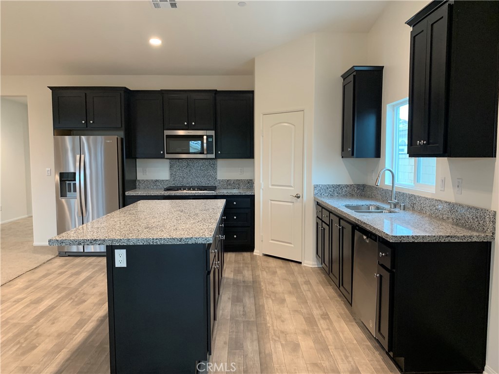 Brand new house with 4 bedrooms and 3 bathrooms, kitchen appliances include oven, microwave, dishwasher and refrigerator. There is also a unique laundry room with washing machine and dryer, and money can be saved by adding solar panels and a patio in the backyard.