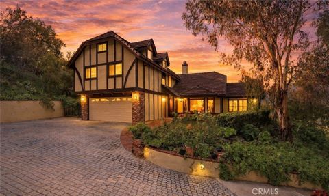 Photo of 24300 Sylvan Glen Rd, Calabasas, CA 91302 (MLS # PW26018891)