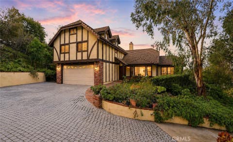 Photo of 24300 Sylvan Glen Rd, Calabasas, CA 91302 (MLS # PW26018891)