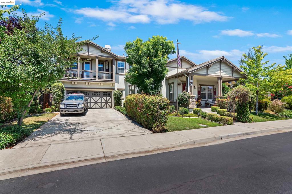 *Open House: 7/26-11am-3pm* Luxury living at its finest in Granville Estates! This stunning 4,314 sq ft home features elegant hand-scraped hardwood flooring and a beautiful wrought iron staircase, large bright double door flex room (optional 5th bedroom) and vaulted ceilings. The spacious great room complete with a cozy fireplace is bathed in natural light and is perfect for relaxing or entertaining. The gourmet eat-in kitchen is a chef's dream, showcasing granite countertops, stainless steel appliances, 5 burner gas cooktop, built in oven/microwave, ample cabinetry, along with a spacious walk-in pantry and butler's pantry. Enjoy added convenience with custom shutters, a dedicated holiday light switch, 4 car tandem garage with a bump out for your workshop and OWNED 32 panel SOLAR! Upstairs, unwind in the loft with an attached outdoor balcony. The luxurious primary suite boasts his and her walk-in closets, a spacious sitting area with a fireplace, and a spa-like ensuite with a garden soaking tub and walk-in shower. Set on an expansive prime 11,966 sq ft lot (over a quarter-acre), your private oasis includes a bridge covered koi pond, tiered decking with an outdoor kitchen, hanging bed, and beautiful fruit trees. This is more than a home; it’s your dream lifestyle! Welcome Home!