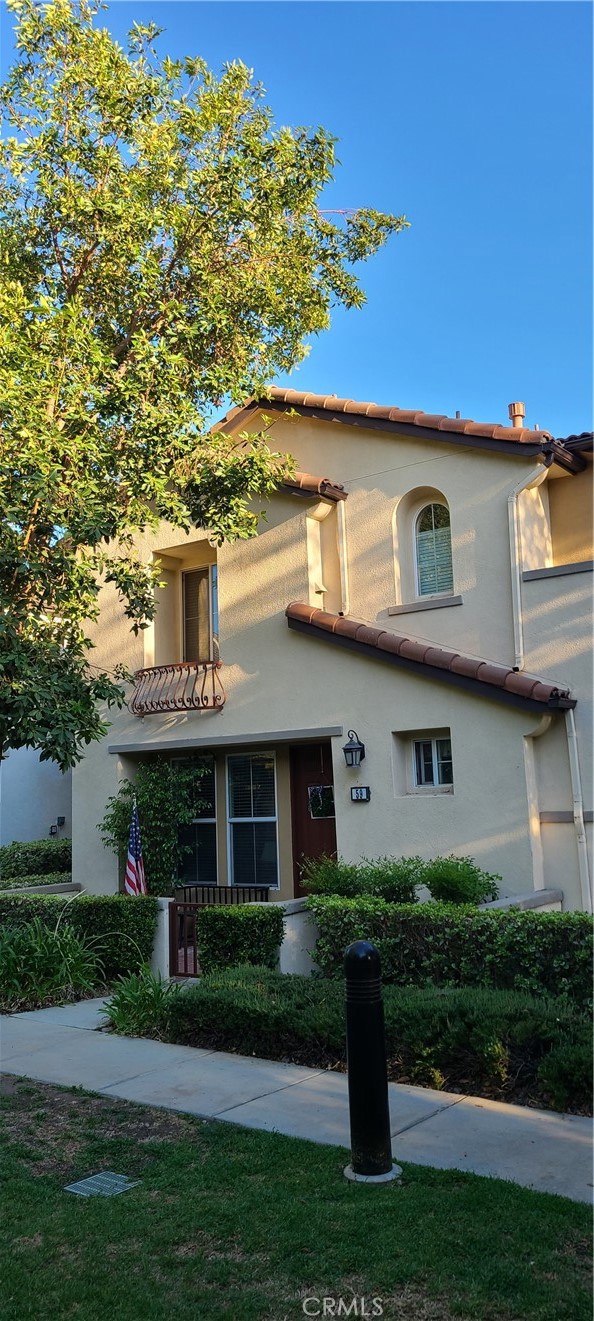 This bright and spacious 4-bedroom, 2.5-bathroom corner-unit condo, nestled in the gated Rosabella community within the desirable Shady Trails neighborhood of North Fontana. Located on a corner lot, this home shares just one wall, ensuring added privacy. The inviting gated front courtyard overlooks a tranquil greenbelt. Inside, you’ll find a cozy living room with a charming fireplace, seamlessly flowing into the open-concept dining area and kitchen—an ideal space for both everyday living and entertaining. The kitchen features granite countertops, walk-in pantry and plenty of storage. A half-bath is conveniently located downstairs for guests. Upstairs, you will find all four bedrooms, a laundry room, and a versatile loft that can serve as an office, playroom, or potential 5th bedroom. The spacious primary bedroom is filled with natural light and features a large walk-in closet. Master bathroom offers a relaxing soaking tub, a separate standing shower, and a dual-sink vanity. The three additional generously sized bedrooms are located down the hall from the primary suite, sharing a full bathroom. In addition to the private front courtyard, this home also boasts a low-maintenance side patio with red brick—perfect for relaxing. The two-car attached garage provides additional storage and convenience. Additional upgrades include laminate flooring downstairs. As a resident of this community, you’ll enjoy access to a variety of exceptional amenities through the HOA, including the Parkhouse community center with two Olympic-sized pools, a movie theater, gym, billiards room, and tennis courts. The HOA dues also cover water, sewer, and trash utilities. This home is perfectly situated near shopping, dining, schools, parks, and major freeways (210 & 15), offering the ultimate in convenience and location. Don’t miss out on the chance to make this beautiful home yours!