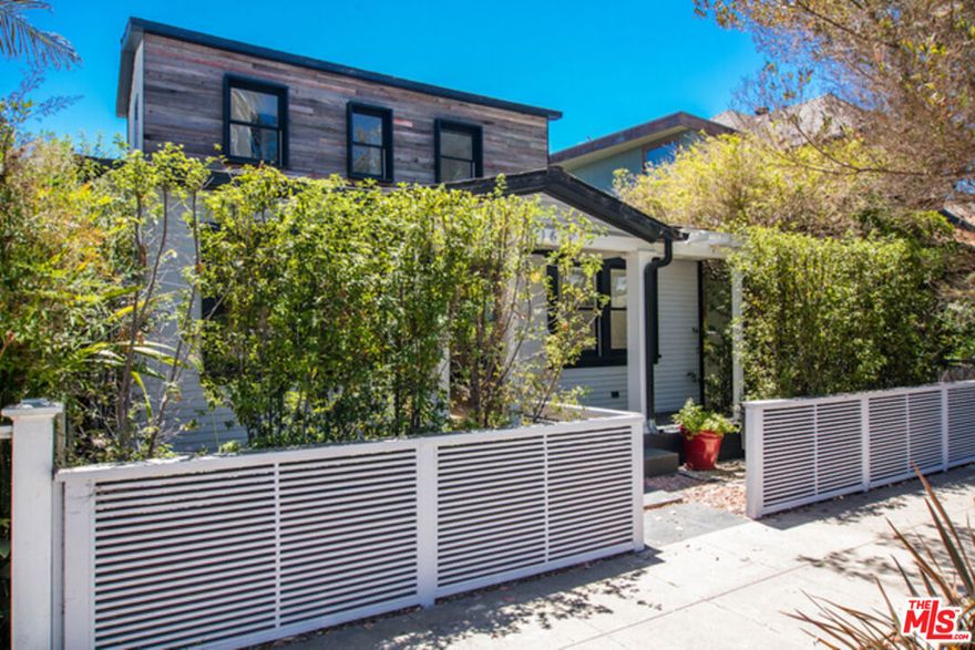 Impeccably maintained craftsman with 3 bedrooms and 3 baths located on a quaint street a block off Abbot Kinney, and a few blocks from Venice Beach. A welcoming porch invites you into a bright and airy open concept living room, dining and gourmet kitchen with direct access to the yard for entertaining. The master suite features a walk-in closet, vaulted ceilings, bathroom with dual vanities and access to the deck overlooking the yard. Another bedroom with built out closets and a full bath are adjacent on the main level. The second level features a spacious bedroom with its own full bath. 2 car parking behind a motorized gate. No expense was spared on finishes: Nest and Ring systems, central air, marble countertops, multiple sky lights, wood floors throughout with separate washer/dryer closet and ample storage complete this chic retreat - an absolute must see!