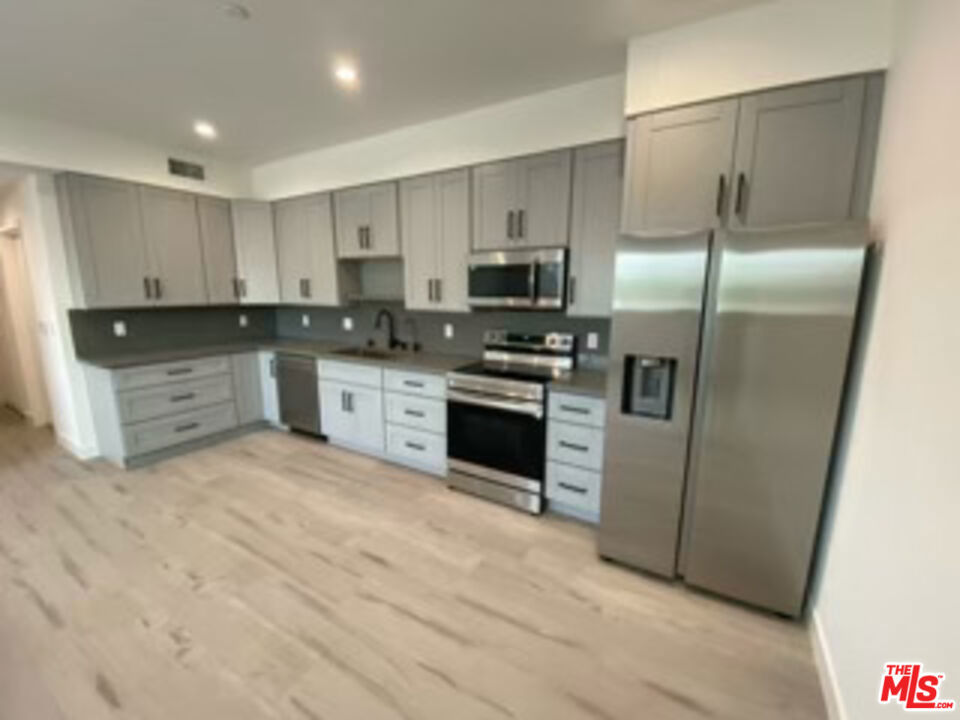Stylish & Modern Living Brand New Back House. Tucked away in a desirable and safe neighborhood, this exquisite back house offers comfort, style, and convenience. Located on the second floor, this beautifully designed unit features 3 spacious bedrooms & 2.5 bathrooms. Large, open-concept living room. Modern kitchen with sleek cabinetry and brand-new smart Samsung appliances. Energy-efficient solar system and central air conditioning. Convenient access to the 118 freeway. Close proximity to top-rated schools, shopping centers, and dining. No smoking allowed. Renters insurance is required. This is a rare opportunity to enjoy modern living in a prime location. Don't miss out! A must see!