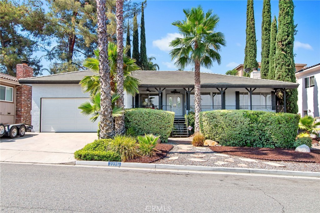 Tucked within the prestigious gated waterfront community of Canyon Lake, this beautifully maintained single-story home blends comfort, charm, and modern upgrades. From the moment you arrive, the expansive deck welcomes you with stunning views of the rolling hills, nearby development, and even a glimpse of the East Bay of the lake — the perfect spot to start your mornings with coffee or wind down with a sunset. Step through the French doors into a wide entryway that creates a grand first impression. To the right, the open living area features a stone veneer fireplace and walls of windows that flood the space with natural light and capture the scenic surroundings. To the left, you’ll find a cozy breakfast nook framed by large windows and a remodeled kitchen complete with shaker cabinetry, stainless steel appliances, and granite counters. All three bedrooms are generously sized, with the secondary rooms larger than average and designed with oversized windows and ample closet space. The bathrooms have been tastefully updated, with newer flooring and fixtures — a tub/shower combo in the hall bath and a walk-in shower in the primary suite. Throughout the home, you’ll notice thoughtful upgrades including bamboo flooring, new carpet, and fresh interior and exterior paint. Additional highlights include an oversized two-car garage (large enough for a car lift), an enclosed back patio perfect for entertaining or a game room that adds an additional 435 square feet of indoor space on top of the 1721 square feet, and abundant under-home storage. Recent updates also include a newer roof, a 200-amp electrical panel, and brand-new deck carpeting. Living in Canyon Lake means enjoying a truly unique lifestyle with a private 400-acre lake for boating, fishing, and waterskiing, plus 16 parks, an equestrian center, 18-hole golf course, sports courts, pools, dog park, hiking and biking trails, community events, BMX pump track, golf cart friendly streets, and more!!!