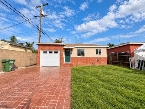 Photo of 937 W Cedar ST, Compton, CA 90220 (MLS # PF26233771)