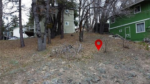 Photo of 707 Blue Bird Ln, Arrowbear, CA 92382 (MLS # HD25252349)