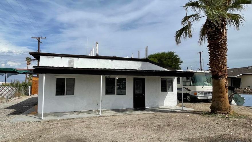 Great opportunity to own to this beautiful upgraded single-family home in the Salton City Beach area. This single-family home was built in 1967, the property features 3 bedroom and 1 bath, sitting on a large 6154 sq. ft. lot with much potential. There is a detached 2-car garage on the back area of the house. This home offers great curb appeal, as it features a beautifully front covered patio with a large driveway. As you walk in, you are welcomed to a family room with an open floor plan that brims with natural lighting. The kitchen offers new quartz counter tops, backsplash, newer kitchen cabinetry and tile flooring, there is a remodeled bathroom with a large walkin shower area, inside laundry, newer windows, this house is perfect for first time home buyer, is a must see !! Buyer to verify sq. ft. and permits.