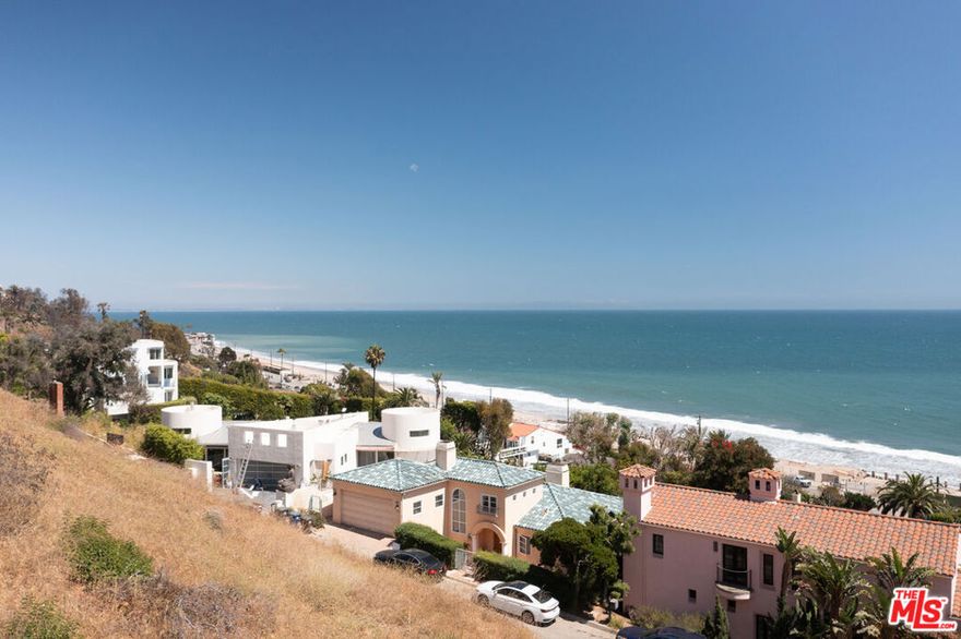 Two miles south of Surfrider Beach and the Malibu Pier, between Las Flores and Carbon canyons, the tight-knit La Costa community offers panoramic coastline views, minutes from the beach. Public beach access is only two-tenths of a mile down the street, and ownership of this parcel grants deeded access to the La Costa Beach Club. At night, the Queens Necklace sparkles, a string of coastline lights from Malibu to Palos Verdes, with Catalina beyond. This attractive parcel comes with an abundance of potential. Most recent geology report (see MLS "Documents") says that "Based upon the estimated thickness of the landslide debris (25 to 60 feet thick), the feasibility of obtaining a permit for residential development of the subject property is considered very low to remote", so the value of the property may be primarily in Beach Club membership.