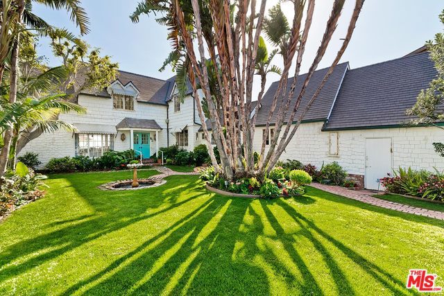 Set on 60 feet of pristine Malibu Colony beach frontage, this classic Colony beach house is only one of eight oceanfront properties to have a pool in this exclusive guard-gated community. The expansive deck space offers endless ocean views up and down Colony Beach. An inviting large grassy courtyard leads to a 2-story guesthouse and a lagoon style pool/spa surrounded by lush foliage. The warm and welcoming formal living room has a lovely view of the Pacific Ocean. Main house includes two spacious guest bedrooms and a master suite facing the ocean. Easy access to the best shopping and restaurants Malibu has to offer. ONLY COLONY BEACHFRONT HOME CURRENTLY AVAILABLE inside the gates. Buyer to verify and satisfy self to all permits and square footage.