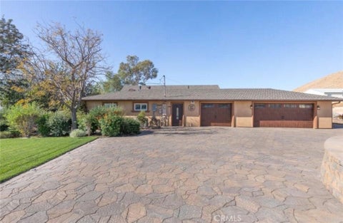 Photo of 8931 Granite Hill DR, Jurupa Valley, CA 92509 (MLS # IV26155065)