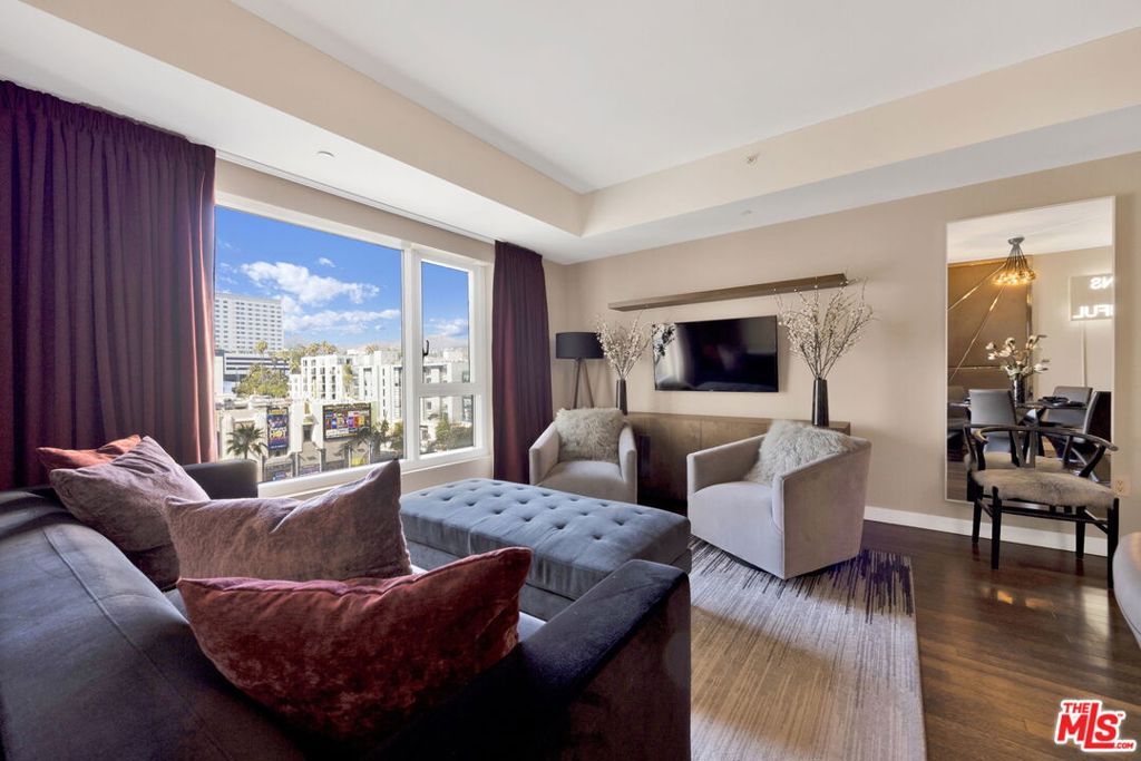 Step into Hollywood glamour with this one-of-a-kind residence at the iconic W Residences once home to an Emmy-winning actress and advocate. Available fully furnished or unfurnished, this designer-curated condo blends modern sophistication with unmatched convenience in the heart of Los Angeles. Inside, floor-to-ceiling triple-paned windows frame vibrant city views while keeping your space serene. The open-concept layout flows seamlessly from the chef's kitchen featuring sleek custom cabinetry, gold-accented fixtures, and premium appliances to the chic dining and living areas perfect for entertaining.Retreat to the spacious primary suite with a spa-inspired bath, complete with dual vanities, a soaking tub, and a walk-in closet fit for a Hollywood wardrobe. For the flex second room, Closet Factory designed and built out a fully customized Glam Room, where the celebrity owner prepared for countless red carpet and award show appearances. This thoughtfully built space boasts abundant storage and a professional vanity setup--perfect for anyone passionate about beauty, influencing, or simply living their most glamorous life. Living at the W means resort-style perks: a rooftop pool with private cabanas, state-of-the-art fitness center, and 24-hour concierge service. Outside your door, Hollywood's best dining, nightlife, and entertainment await. A rare opportunity to own a piece of celebrity real estate history--paired with world-class amenities and a location that's second to none.