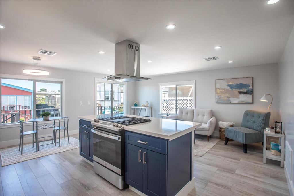 This home has been tastefully updated in & out with the comforting style of a Coastal Cottage, that reminds us of what living near the sea is about. Whether you are looking for a primary home or a getaway retreat this home is a must-see! It has been freshened with low maintainance landscape, modernized siding, painted in & out, laminate plank floor has been added for easy care and durability. The kitch has beautiful Quartzsite counters, newer appliances, gas stove, DW, refrigerator, garb disp. Kitchen has eating bar which opens to the living area for ease of gathering and conversation with updated expansive front deck. Bath has a newer tiled shower and fixtures, with lg opulent double sink vanity with plenty of storage, reminiscence of coastal colors. Driveway has a covered carport for 2 cars. A newer ext shed has room for add storage, workspace or essential beach gear. In the desirable 55+ Canada Cove Park, on leased land with monthly space rent. Park approval is required to finalize purchase of the home. There is a comm pool, sauna, clubhouse with activities and exercise gym, all has been recently refreshed. Nearby greenbelt trail leads to the beach. Close to golfing, beaches and downtown HMB. Get ready to enjoy living on the Coast in this move-in ready home!