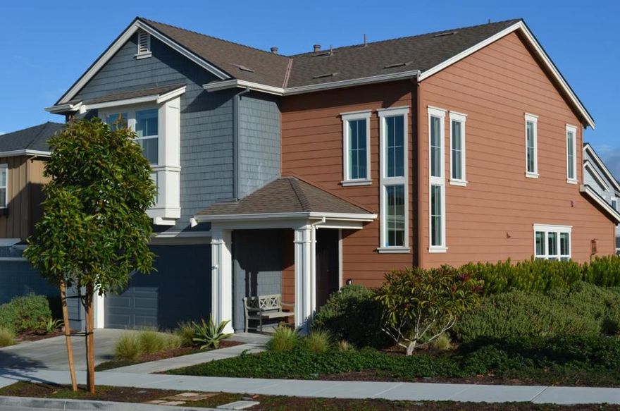 Walk to the beach and shopping from this 4 Bedroom, 2.5 Bath home which is a rare find at The Dunes on Monterey Bay. Situated on a spacious corner lot across from a neighborhood park and the developing Hilltop Park on 9th Street, your family is never far from fun. This sunny Beach House Plan-1 features the popular front loading garage access and an expansive Trex deck patio with open park views. Other amenities include French Oak Belgian Brown wood flooring upstairs and down, upgraded carpet on the stairway, a LifeSource Water Filtration system, white subway tile in the kitchen, surround sound in the living room, overhead fans in all bedrooms and designer backsplash tiles surrounding the fireplace and in all the bathrooms. You can hike and bike right from your front door to the ocean at the Fort Ord Dunes State Park.  All this, along with proximity to the new Promenade, Montage Wellness Center and The Dunes Shopping Center ensures the long-term viability of this offering.