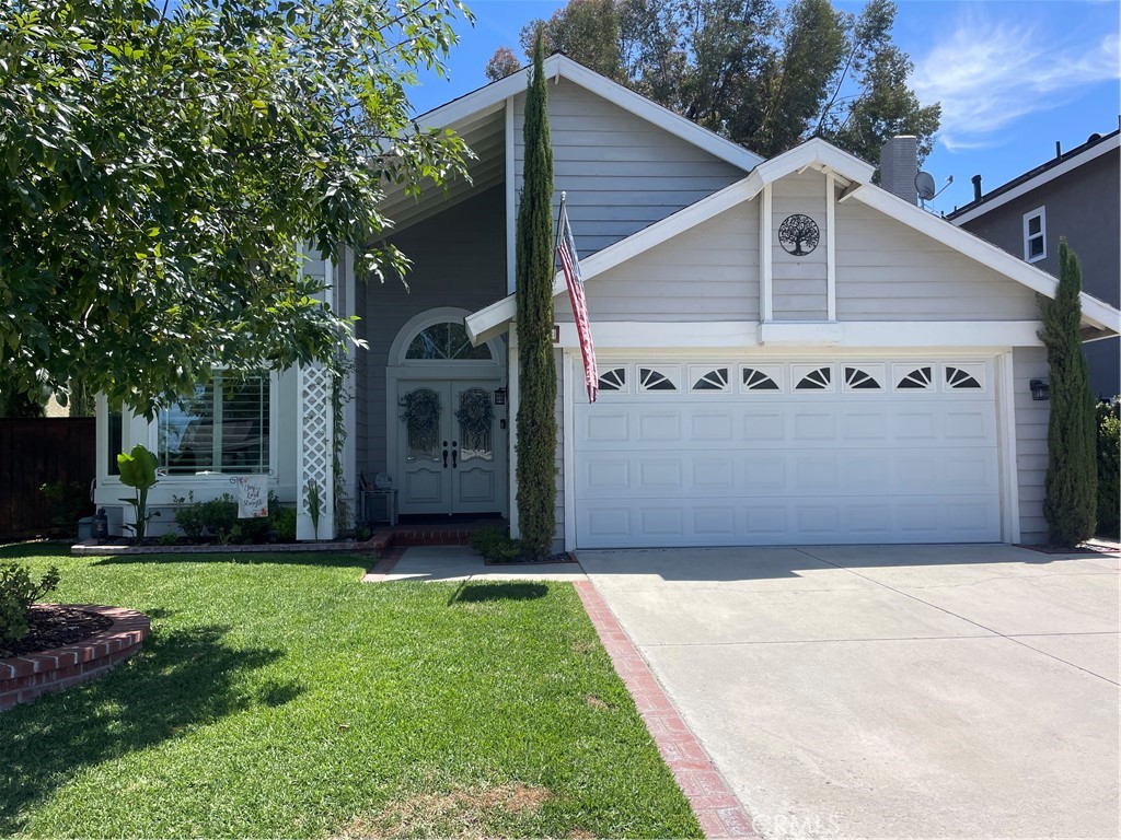 SINGLE-STORY Home in Very popular Robinson Ranch. Very close to the neighborhood park Rec Area. This home has been tastefully upgraded and offers 1,241 feet of Single-Level living space. Entering this Home through custom double doors you will see how the home opens up with Vaulted Ceilings in the Living and dining areas. The warm engineered wood floors and neutral wall color make you feel right at home. The fireplace compliments the open concept. Stepping through the dual pane slider door you will find a vaulted covered patio which is perfect of entertaining. The private back yard features artificial grass, vinyl fencing, custom plantings and a water feature provide a perfect setting. The Kitchen features warm oak cabinets, Granite counters, High End Jen Air appliances, 18" tile floors and Plantation Shutters. The Primary Bedroom features warm carpet floors, vaulted ceilings, and French Doors that lead out to a backyard patio sitting area. The Primary also includes a walk-in closet and the bathroom features custom tile walls around the tub/shower combo. There is also a large second bedroom which is being used as an office features French doors, vaulted ceiling and a murphy bed. The built-out Garage features painted floors 5 large cabinets and a pull down stairway to additional storage above the garage ceiling. The home has 20 solar panels which were installed in 2017 which has provided very low or no power bills for the existing owners. These panels are owned not leased. This home is located in a very desirable area which includes low HOA and very low Mello Roos.