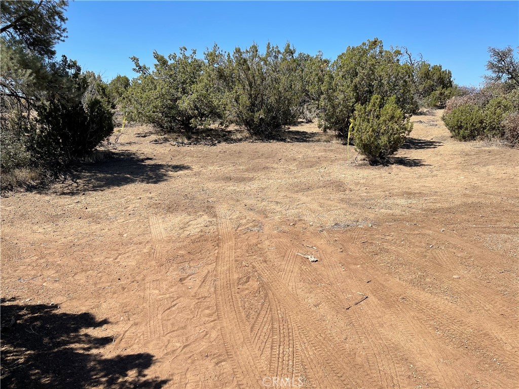 Residential Vacant 20-acre land is in the Sand Canyon area of Tehachapi City. A Storage is built on-site with Solar power and a bathroom. Water pipes with a fire sprinkler system are installed on the land connected to the City Water Meter. Electricity is available to be connected from the property line. Many houses are built near the land. Possible uses for this land can be new homes for retirement or retreat.