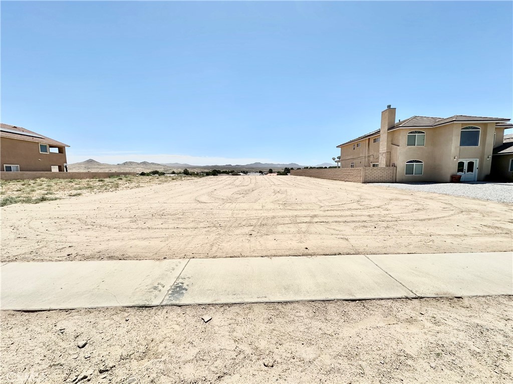 Great Opportunity in Helendale! This parcel of land is located in the desirable community of Helendale WITH ALL UTILITIES, offering a prime location near local shops, schools, and restaurants. Conveniently situated close to Highway 395 and the scenic Happy Trails Highway, it's an excellent spot for commuters with easy access to major freeways. Helendale is home to the Silver Lakes community, known for its exceptional amenities including a 27-hole championship golf course, two private lakes for boating and fishing, sandy beaches, a community pool, fitness center, tennis courts, equestrian facilities, and a clubhouse with year-round events and activities. Whether you're looking to build your dream home or invest in future development, this property offers the perfect blend of accessibility, recreation, and community living. Includes Plans and permits for the construction luxury house.