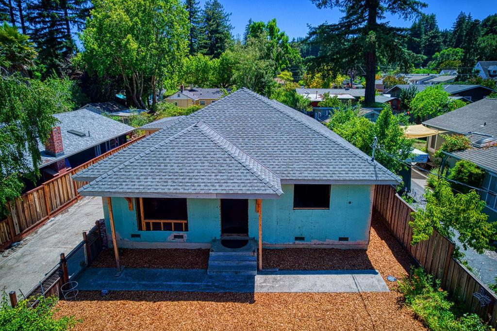 Incredible opportunity for the discerning Buyer, Investor and/or Builder to finish remodeling this single-level, gorgeous home and detached garage on flat land and own in the most sought-after, sunny, walkable neighborhood; Felton Acres. A higher foundation level perches the home in a way to capture views of green hills from the living room. All permits are current and approved by the County of SC. Build away today! This thoughtfully-designed property in mid-renovation comes with sophisticated building, landscape and septic plans from local experts. Engineered septic designed to add a future ADU. Stunning engineered trusses, new electrical main panel and comp roof installed in 2023. Gorgeous hardwood oak floors, lots of light and parking. Front and back yards flat and graded. Designed for a progressive Heat/AC pump system with ducted air in attic throughout house. Extra tall storage room in attic to be accessed by drop-down ladder. Walk one block to the Farmer's Market and a few more to downtown's hip breweries, wineries, cafes, boutiques, the new library, post office, Wild Roots Market, Henry Cowell's redwoods, camping and trails, epic mountain biking and the iconic Covered Bridge Park with pump track. 15 minutes to Santa Cruz's beaches and UCSC. Fruitful plum tree and roses.