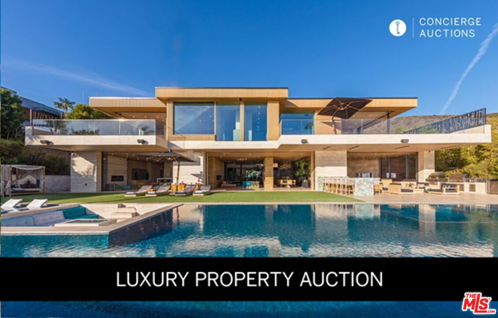 LUXURY PROPERTY AUCTION: June 24th. No Minimum Bid Required. An extraordinary contemporary masterpiece awaits at 11870 Ellice Street, where ancient wisdom meets modern luxury on one spectacular acre overlooking the Pacific Ocean. This architectural marvel features a breathtaking ninety-five-foot infinity pool with unobstructed ocean views, six private bedroom suites, each with dedicated terraces, and resort-inspired amenities designed for grand-scale entertaining. Completed in 2022 with super-engineered concrete construction built to last centuries, this unique estate embodies the vision of MKH Developments through meticulous Feng Shui principles and Indonesian-inspired design elements. Hand-carved natural stone walls, a two-thousand-gallon aquarium, a twenty-thousand-gallon koi pond, and floor-to-ceiling motorized glass walls create an immersive sanctuary where indoor and outdoor living seamlessly converge.