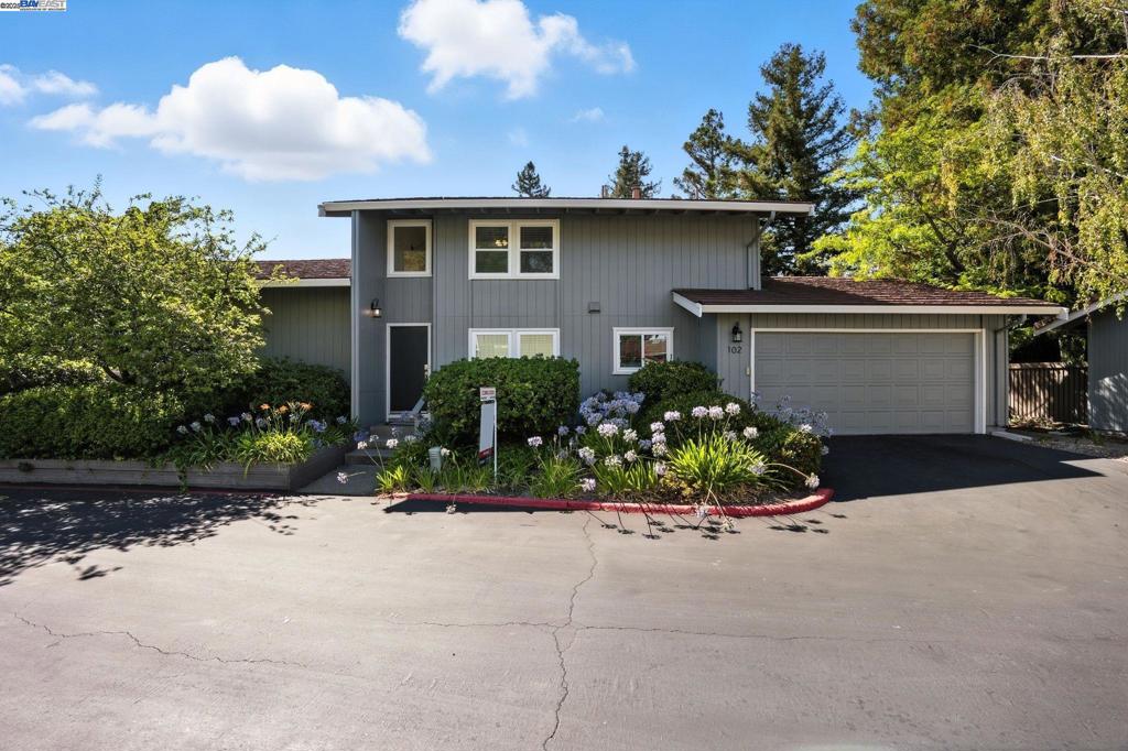 East Facing, Beautifully Updated, Serene Corner Lot in the Rolling Greens Neighborhood in Pleasant Hill. Ideal location close to shopping, downtown Pleasant Hill, Diablo Valley College, Freeway Access, Pleasant Hill BART, Schools, Parks & Hiking Trails. Stunning Mid-Century Modern Architecture w/beam vaulted ceilings featuring a wall of windows bringing the outside in, floor to ceiling brick wood burning fireplace w/a gas log starter & luxury vinyl plan flooring throughout. Gourmet kitchen w/granite countertops, breakfast bar, white shaker cabinets, black appliances, coffee nook & direct access to dining room. Primary bedroom w/walk-in closet, sliding glass door to the backyard deck & large private vanity & door to shared hall bathroom w/2nd vanity & shower/tub combo. A spacious 2nd bedroom is on the 1st floor with large closet. Versatile open loft upstairs w/ceiling fan is a great space for a home office, play area or family room. 3rd bedroom upstairs w/large closet. Full bath upstairs with stall shower. Low maintenance spacious paver patio i& deck s a great space for BBQ's & outdoor entertaining. Two car attached garage w/additional shelving, laundry w/washer & dryer included. Tranquil neighborhood w/walking paths, mature trees, community pool & clubhouse.