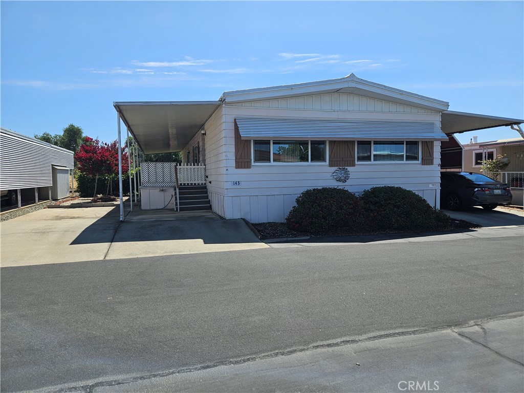 Come see this well care for, 3 bedroom home in the Olive Hill Senior community! This well maintained home features newer laminate flooring and carpet in the bedrooms, solid wood soft close cabinets in Kitchen and bathrooms; kitchen renovated with stainless steel appliances; walk in shower in the master bath; tons of storage in every room; extra bedrooms for guest or office space; 2 storage sheds quipped with power; and a wonderful gardening area with mature landscaping and a view of back property with sheep! Very nice covered patio/porch to sit out and enjoy quiet mornings and evenings. The home also has a large 2 car covered area for parking with extra parking on the other side. Refrigerator, washer and dryer included! Home is clean and move in ready!
Community Amenities: clubhouse, swimming pool, recreational facilities, billiard room, library, fitness center, and planned Social Activities.
Don't miss this opportunity to experience the best in senior living!! Schedule a tour today!