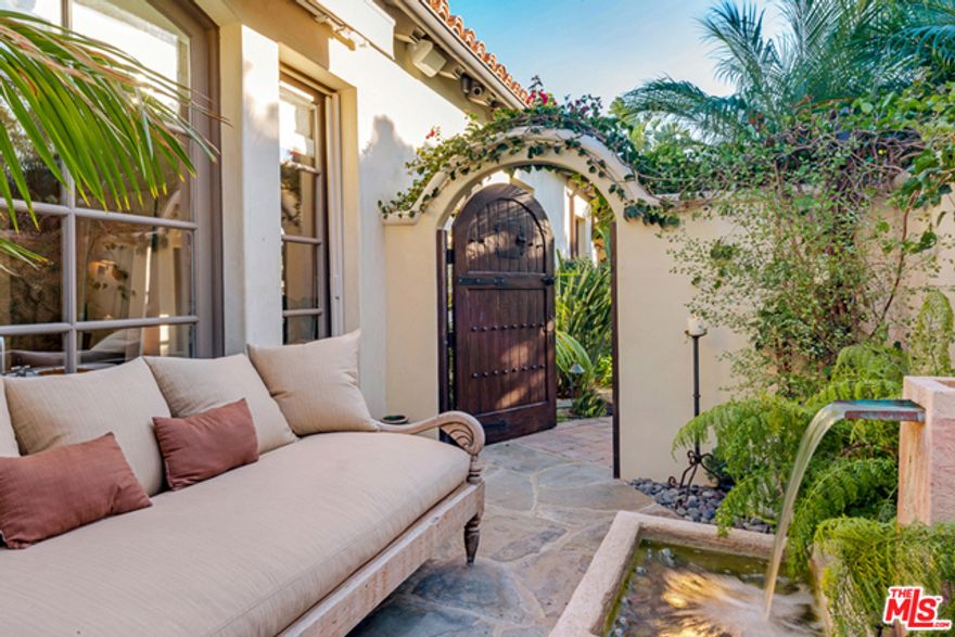 Set in the heart of Malibu, this private and gated magnificent one story bluff top estate offers breathtaking white water and coastline ocean views, complete with a beautiful landscaped courtyard, organic garden and paddle tennis court. This Villa offers a creative blend of materials, with an elegance and simplicity for the casual indoor and outdoor living experience. A gourmet cook's kitchen opens to a beautifully appointed ocean view living room, den and dining area. The ocean view master suite includes an expansive bath area and an expanded master closet that opens to a fireside pergola sitting area leading to a stunning ocean view poolside entertaining area. There are 4 additional large bedrooms with bath suites, an office, studio, guest suite and gym putting green, rose gardens. As well there are private steps on the property providing access to Malibu Road beach. This is truly an exquisite Malibu bluff retreat by the sea.