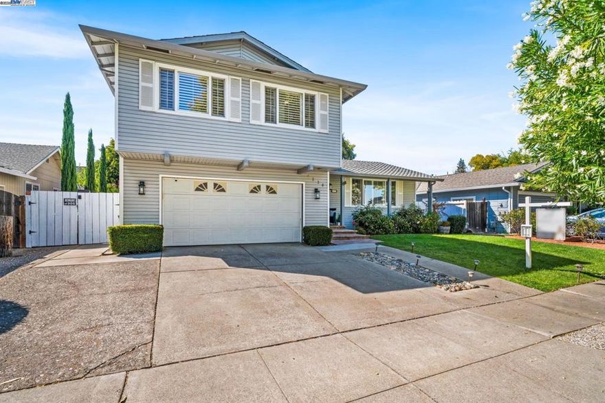 Welcome to this beautifully updated EAST-FACING home in Pleasanton’s sought-after Highland Oaks neighborhood. Thoughtfully upgraded in Oct 2024, this property combines comfort, convenience, & modern style. Step inside to find fresh paint throughout the home & garage, new wood flooring, & updated crown moulding & baseboards. The expanded entry features new stone steps, modern double front doors, & an upgraded chandelier that makes a stunning first impression. New deck flooring & fireplace. Brand-new water heater installed in Jan 2025. The home is equipped with Nest smart features including thermostats, security system, & doorbell. Recessed lighting brightens the living and dining rooms, new fixtures have been added to all bedrooms, & solar lights illuminate the backyard. Bathrooms have been remodeled with walk-in showers, & custom closets were added in the bedrooms. The kitchen offers white cabinetry, tile flooring, & cozy breakfast nook. Formal living & dining rooms create space for entertaining, while the lower-level family room opens to a private backyard with a large covered patio & sparkling solar heated pool. This move-in ready home is perfectly located near top-rated schools, parks, scenic trails, & convenient freeway access, offering the very best of Pleasanton’s living.