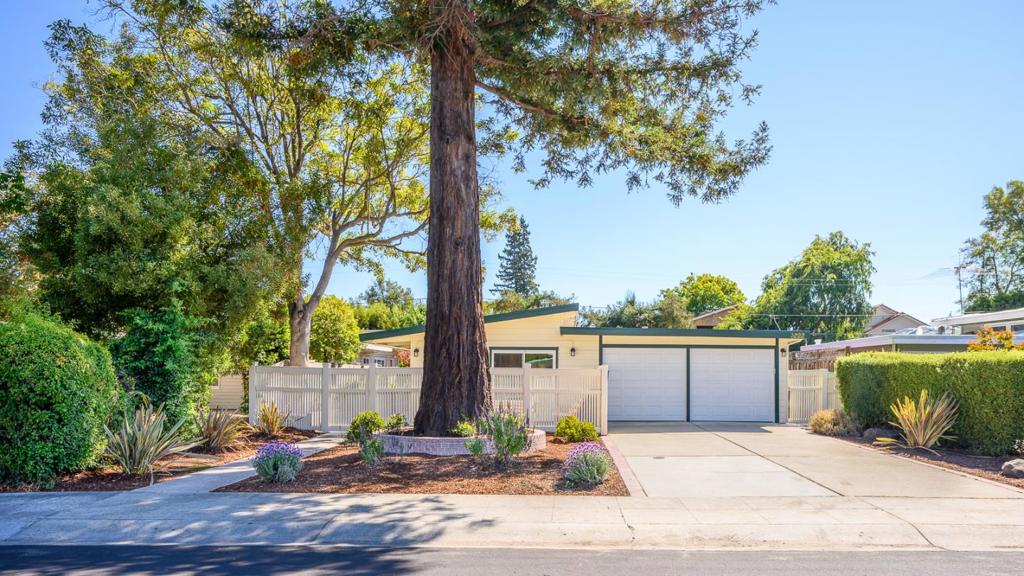 Beautifully remodeled 4BD/2BA home in Palo Altos desirable Midtown neighborhood. This light-filled residence features an open-concept layout, updated kitchen with skylight, stone countertops, stainless steel appliances, and designer cabinetry. The spacious living room includes a fireplace and large doors leading to an expansive backyardperfect for entertaining or relaxing. The primary suite offers a private front-facing patio retreat. Both bathrooms are tastefully renovated. Additional features include luxury vinyl plank flooring, dual-pane windows, fresh interior and exterior paint, and an attached garage with laundry area. Ideally located near top-rated schools, Hoover and Mitchell Parks, Midtown Shopping Center, Stanford University, Caltrain, and major tech campuses such as Google, Apple, Meta, Tesla, Broadcom and more. A turnkey opportunity offering comfort, style, and convenience in one of Palo Altos most sought-after communities. Excellent schools: Gunn High, JLS, El Carmelo Elementary (Buyers to verify availability)