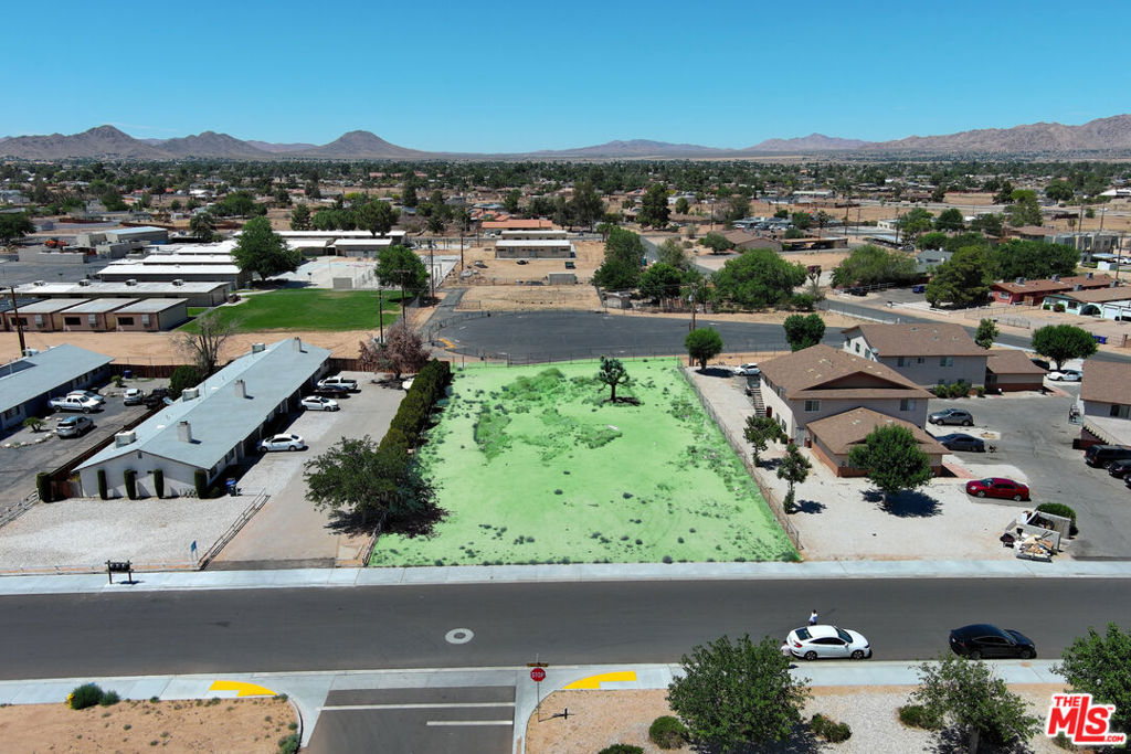 Exceptional opportunity to build in the heart of Apple Valley. Located at the corner of Powhatan Road and Rancherias Road, this flat and buildable lot offers outstanding potential for a custom dream home or a multi-family development tailored for your own family's needs. With room to design, expand, and invest, the parcel sits in a desirable residential area with nearby access to schools, shopping, and major roads. Utilities are close by (buyer to verify), and zoning may allow for multiple units. Whether you're a homeowner ready to bring your vision to life or a developer seeking a solid opportunity in a growing market, this property checks all the boxes.