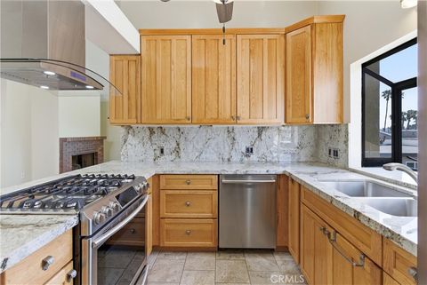 Photo of 16922 Lynn Lane #F, Huntington Beach, CA 92649 (MLS # PW26085388)