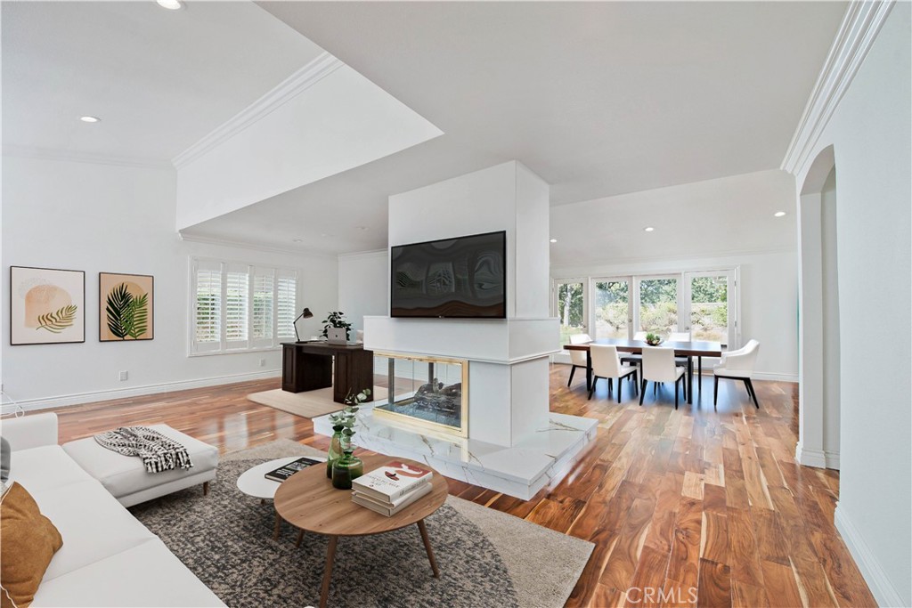 Beautifully refreshed 3-bedroom, 2-bath single-story home tucked into a quiet cul-de-sac in the heart of Westlake Village. Highlighted features include an open floor plan with wood like flooring, quartz countertops, LED lighting, and updated landscaping - adding tranquil charm and curb appeal.
Entering through the double doors leads into a bright living room with vaulted ceilings, crown molding, plantation shutters, modern fireplace, open to a formal dining area. The spacious great room leads to the hardscaped patio with firepit and lush backyard—ideal for entertaining or unwinding outdoors. The remodeled kitchen offers sleek quartz counters, custom cabinetry, and newer stainless-steel appliances. Enjoy the convenience of an indoor laundry room with direct access to the two-car garage with built-in storage.
Located in an award-winning school district, with Triunfo and Evenstar parks nearby. HOA amenities include a large community clubhouse, Olympic-size pool, and tennis courts. Close to restaurants, shopping, scenic Westlake Lake, miles of biking and hiking trails, all with convenient proximity to the 101.
This turnkey one-story home blends comfort, style, and location—perfect for any stage of life.