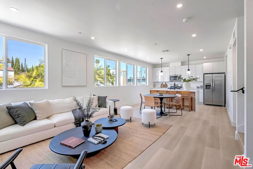 Your opportunity to own a spacious, design-forward home in one of Los Angeles' most dynamic and appreciating neighborhoods has arrived. Introducing "The David I", a newly built 3-bedroom, 3.5-bathroom front-unit townhouse located within a 3-unit new construction apartment complex near the Culver City Arts District. This thoughtfully designed residence features an expansive layout that blends everyday functionality with modern aesthetic appeal. The open-concept main level connects a sleek contemporary kitchen with the living and dining areas, offering an ideal setting for hosting, relaxing, or working from home. A versatile bonus room on the entry level adds flexibility for use as a home office, gym, or creative studio. Upstairs, the well-appointed bedrooms provide space and comfort, including a peaceful primary suite with en-suite bath and ample closet space. This unit also enjoys a dedicated, private grassy front patio, a rare offering perfect for outdoor dining, gardening, or simply enjoying LA's year-round sunshine. Additional features include wide-plank flooring, designer finishes throughout, and side-by-side covered parking for two cars. As a Senate Bill 8 (SB-8) exempt property, this home is not subject to rent control, allowing future owners the freedom to lease the property without restrictions. 2-Car garage as well as private driveway for two additional cars. Located just minutes from Erewhon, Destroyer, the Helms Bakery District, and top employers like TikTok, Google, Sony, and Amazon Studios, this is a rare chance to own modern construction with both lifestyle and long-term investment upside. This is a TIC offering requiring TIC-specific financing or an all-cash purchase. Contact the listing agent for lender referrals and further details.