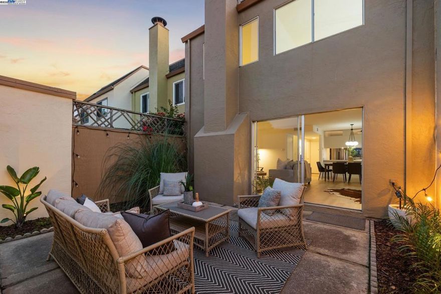 Welcome to 3032 Linda Vista in Alameda's desirable Casitas HOA. This 3 bedroom, 1-1/2 bath Townhome has been thoughtfully updated and is move-in ready. Setback from a serene greenbelt, the kitchen window offers picturesque views of the surrounding landscape; a wonderful vista for starting or ending one's day. The kitchen has been updated with quartz countertops, efficient new stainless steel finish appliances, and large single basin sink. The open floor plan dining and living areas seamlessly connect the interior to the private patio, making indoor/outdoor living and entertaining convenient. The Casitas Clubhouse and pool are nearby for additional outdoor enjoyment.  For privacy, bedrooms are situated on the second floor. The primary bedroom is spacious and offers a walk-in closet. Its beautiful picture window is perfect for sunset viewing. An interior laundry room and detached 2-car garage, additional features of this beautiful home. Area amenities include many parks, lagoon & bayside paths, proximity to highly rated elementary schools and Corica Park Golf Course. Commuters will enjoy the proximity to the Harbor Bay/SF Ferry, OAK Int'l Airport and 880. Stop by for a visit; there's still time to make this your home for the holidays! Alameda~Island Living at its Best!