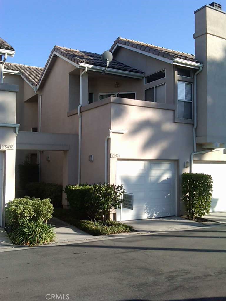 Beautiful Two Story, 3 bed/3 bath, Townhome in Portola Hills, Newer Paint throughout. Newer Carpet for stairs and upstairs bedrooms. Brand new appliances - refrigerator, dishwasher, washing machine and clothes dryer. Hardwood and tile flooring downstairs in kitchen, living room and downstairs bedroom. Kitchen with Breakfast Nook & Counter, Fireplace, Main Floor Bedroom, Views from Large Master Suite with Walk-in Closet, Patio with View, Walking Distance to Elementary School and Park, Across from Community Pool/Gym, And Much More!