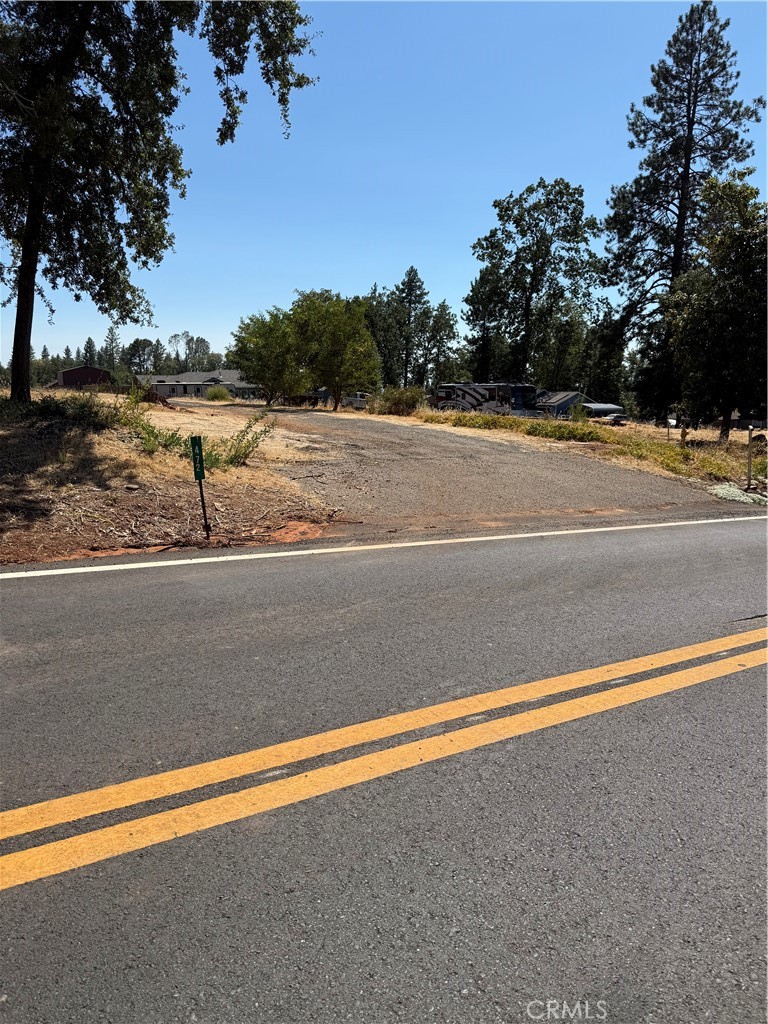 Welcome to Valley View! This spacious lot is located in the wonderful westside neighborhoods of Paradise! From location to the large lot, this is a special property you won’t want to miss out on! The property once boasted a large 1800+ square foot 3 bedroom home alongside a 2 bedroom 800+ square foot home. This property is ready for a new owner to redevelop and help rebuild Paradise! A Fire Hydrant sits near the property passing on security and savings, which is a builders delight! Commuting is a short 15 minute drive to South Chico! Invest in the future and buy your slice of Valley View!