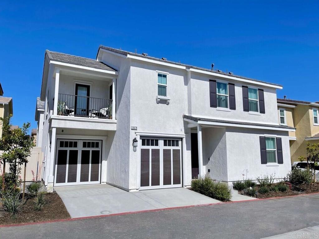 This is it! What a show stopper. Only 4 years old, this gem shows like a model home. Professionally decorated, this house has a lot of upgrades that any person could appreciate. It boasts 6" plank engineered hardwood flooring throughout, pendant lighting in the kitchen, and a hanging draped chandelier in the staircase well. There are window treatments such as blinds and decorative drapesso you can feel right at home. Enjoy the zen water feature, artificial grass, propane fire pit area with umbrella shading. The house also comes equipped with a house water system and alkaline drinking water feature. Take advantage of your large garage which is professionally epoxy coated and there are three car spaces available. Garage also comes with a pre-wired electric car charger.And this is a smart house too! Smart plugs & front door system, smart garage doors, and smart irrigation system. The house alsohas a solar 4.2 KW system that was purchased so enjoy the savings!
