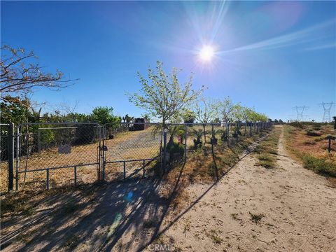 Photo of 11391 Johnson Rd, Phelan, CA 92371 (MLS # HD26064573)