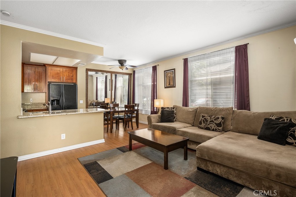 Location, Lifestyle, and Livability! Welcome to the sought-after gated community of Tuscany in Foothill Ranch, where resort-style amenities meet the convenience of a ground-level unit. This charming one-bedroom, one-bath condo offers approximately 692 square feet of thoughtfully designed living space, ideal for first-time homebuyers, downsizers, or anyone seeking easy access. Step inside to find a light-filled interior featuring a spacious living room and an open dining area perfect for everyday meals or casual entertaining. The well-appointed kitchen includes granite countertops, ample cabinet space, and a convenient layout that flows effortlessly into the main living area. The primary bedroom includes a large walk-in closet. The full bathroom is located just outside the bedroom for easy access and features a clean, functional design. A private patio with a laundry closet provides the perfect spot to enjoy morning coffee, read a book, or unwind outdoors. Residents of Tuscany enjoy access to an impressive list of amenities including two pools, two spas, a fitness center, clubhouse, tennis court, putting green, and more. As part of the greater Foothill Ranch community, you will also enjoy access to an additional resort-style pool, parks, sports courts, and miles of scenic hiking and biking trails.
Located near shopping, dining, the Foothill Ranch Library, and the 241 toll road, this home truly offers the best of comfort, convenience, and community. Come see why this is one of the most desirable locations in Foothill Ranch.