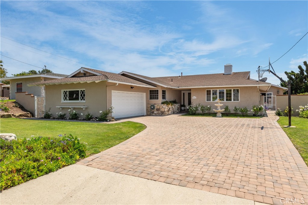 Experience coastal living in this beautifully maintained single level home that has 2,570 sq ft of living space on a spacious 12,361 square foot flat lot. The expansive yard is ideal for entertaining, outdoor activities, or family fun. Featuring stunning ocean vistas, this cozy and inviting residence offers the perfect blend of comfort and scenic beauty. Inside, you'll find an open floor plan, updated modern kitchen, dual-pane windows, recessed lighting, smooth ceilings, an electric charger for your car, and spacious, light-filled living areas that create a warm and welcoming atmosphere. Located on a quiet cul-de-sac street, this charming home is a perfect sanctuary for relaxing and entertaining in style! Don’t miss out on the fabulous opportunity!