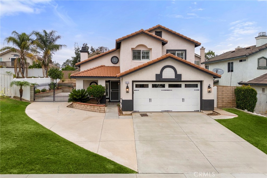Welcome to 938 Cheyenne Rd, a beautifully updated 3 bedroom, 3 bathroom home nestled in the highly sought-after community of Corona Hills. This stunning property offers the perfect blend of modern upgrades, comfort, and convenience ideal for families, professionals, or anyone seeking the Southern California lifestyle. Step inside and be greeted by an open-concept floor plan with vaulted ceilings, abundant natural light, and luxury vinyl plank flooring throughout. The entire home has been recently painted, along with custom lighting finishes, and recessed can lights. The primary suite offers a peaceful retreat with a large closet, dual sinks, and a spa-inspired shower. Two additional bedrooms provide plenty of flexibility for guests, a home office, or playroom. Step outside to your private backyard oasis—complete with a covered patio, lush landscaping, and ample space for dining, relaxing, or hosting under the stars. Lastly don't forget about your recreational toys. This home offers a very large side parking perfect for your RV, boat, or anything you want to store.