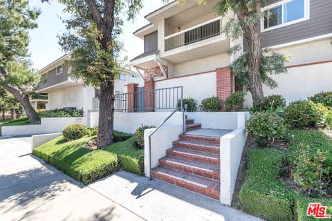 Photo of 10201 Mason Avenue #108, Chatsworth, CA 91311 (MLS # 26834903)