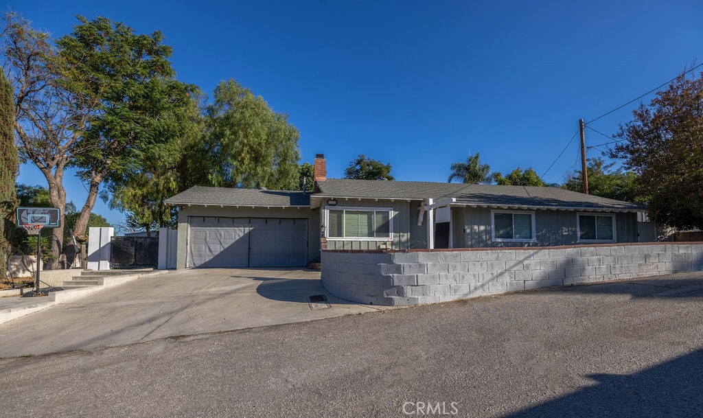 Welcome to this beautifully maintained 3-bedroom, 2-bathroom home offering 1,228 sq ft of comfortable living space on a generous 9,189 sq ft lot. Ideally located just minutes from Castaic Lake, outdoor enthusiasts will love year-round access to fishing, boating, hiking, and water sports.
Inside, the home features upgraded flooring throughout, tastefully remodeled bathrooms, and a functional layout perfect for everyday living. Recent improvements include an updated electrical panel, new water heater, and energy-efficient leased solar panels to help lower utility costs.
Step outside to an entertainer’s dream backyard—complete with a large covered patio, string lighting, a cozy fire pit area, and a spacious lawn for relaxing or entertaining.
This turnkey property offers privacy, modern upgrades, and unbeatable access to one of the area’s top recreation spots. Don’t miss your chance to make this Castaic gem your own—schedule your private showing today!