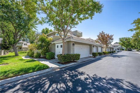 Photo of 26127 Mcbean Parkway #35, Valencia, CA 91355 (MLS # SR26162131)