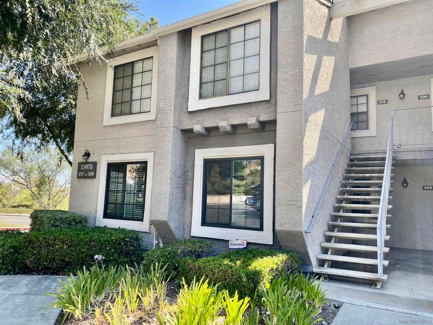 Enjoy your morning coffee on your peaceful, private balcony with mountain views! This beautiful 2 bedroom 1 bath top floor end unit boasts extra windows and a wood burning fireplace. Spacious balcony with secure storage.  Full size washer and dryer in unit. Parking includes two oversized spots, one covered and are conveniently located in front of the unit. Ample guest parking throughout the community. Community features 2 pools, hot tub, sauna, tennis courts, basketball courts, exercise room, club House and secured mail room. Walking distance to retail, dining, Costco & award winning Poway schools.